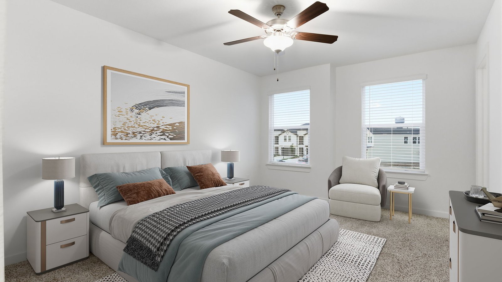 Primary bedroom with plush carpet floors and light allowing double windows