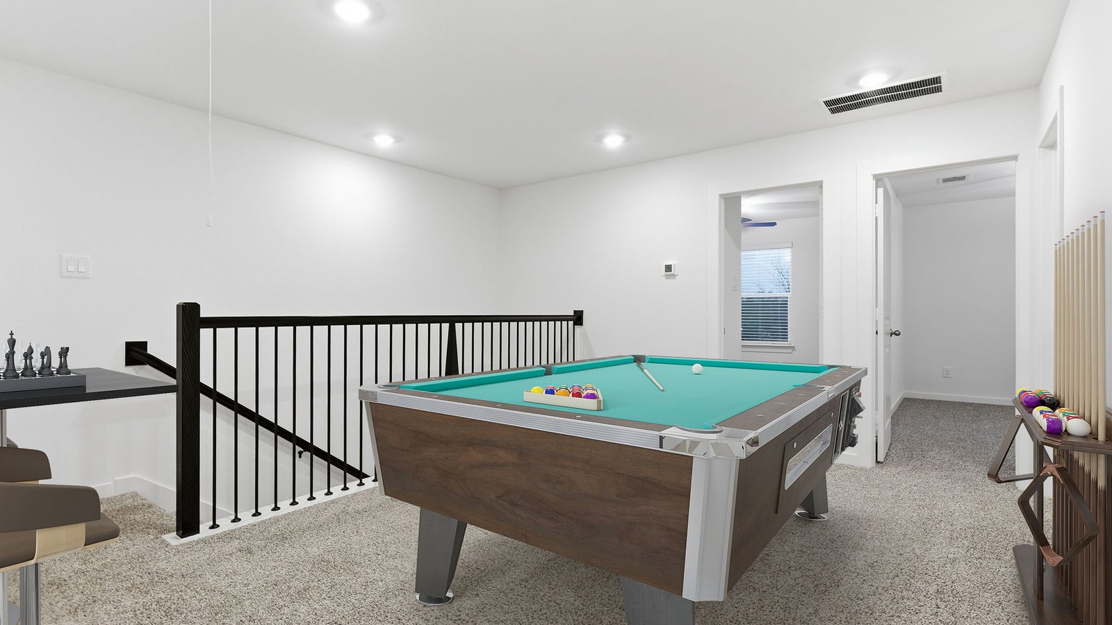 Upstairs landing space perfect for a game room or entertainment spot