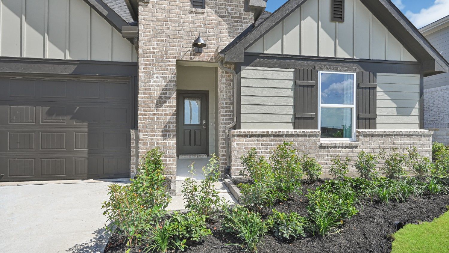 Single story classic brick home with front entry