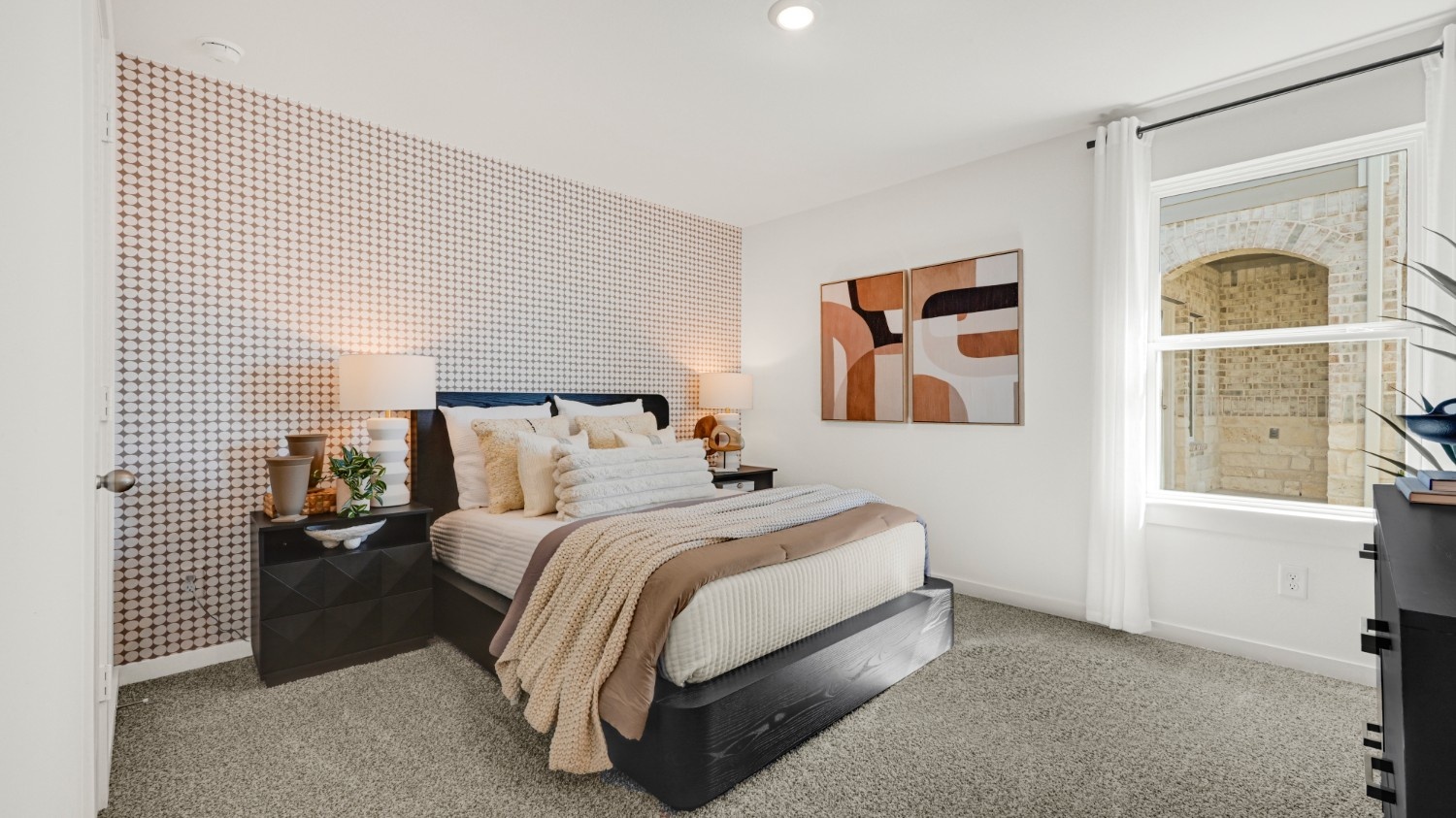 Guest bedroom 2 with side window and plush carpet floor