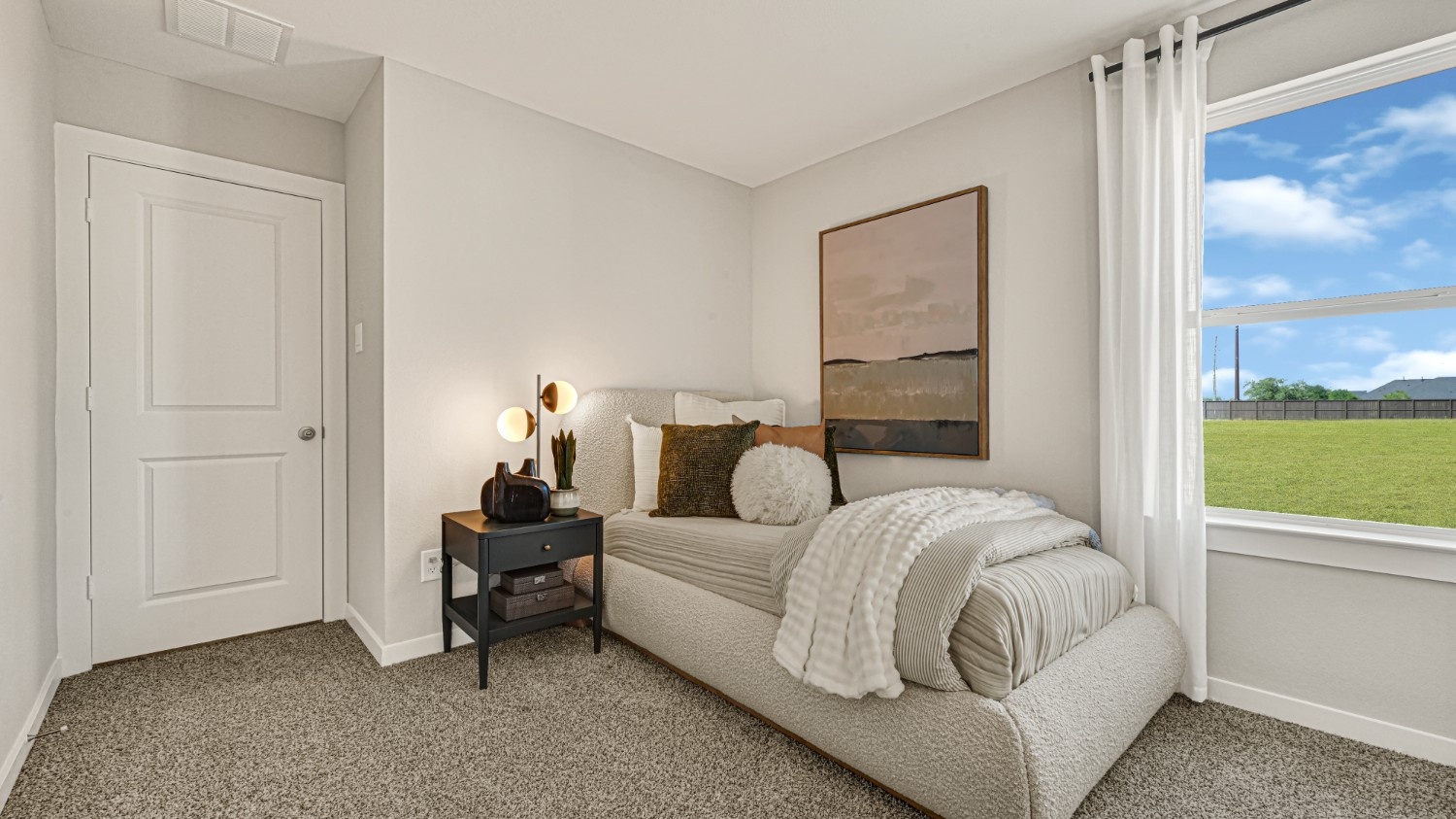 Guest bedroom 3 with plush carpet floors and spacious closet