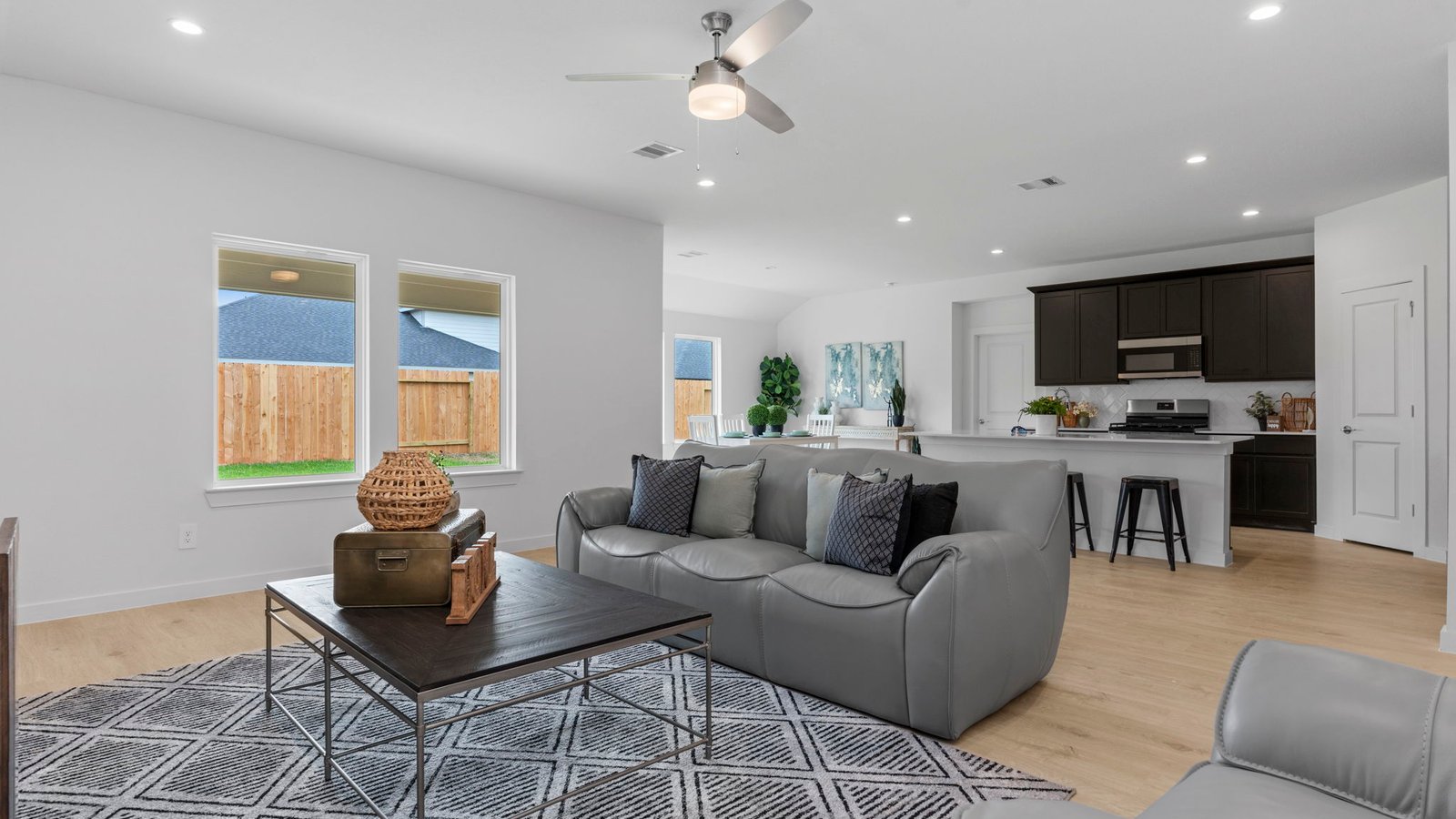 Open living and family room area with ample natural light