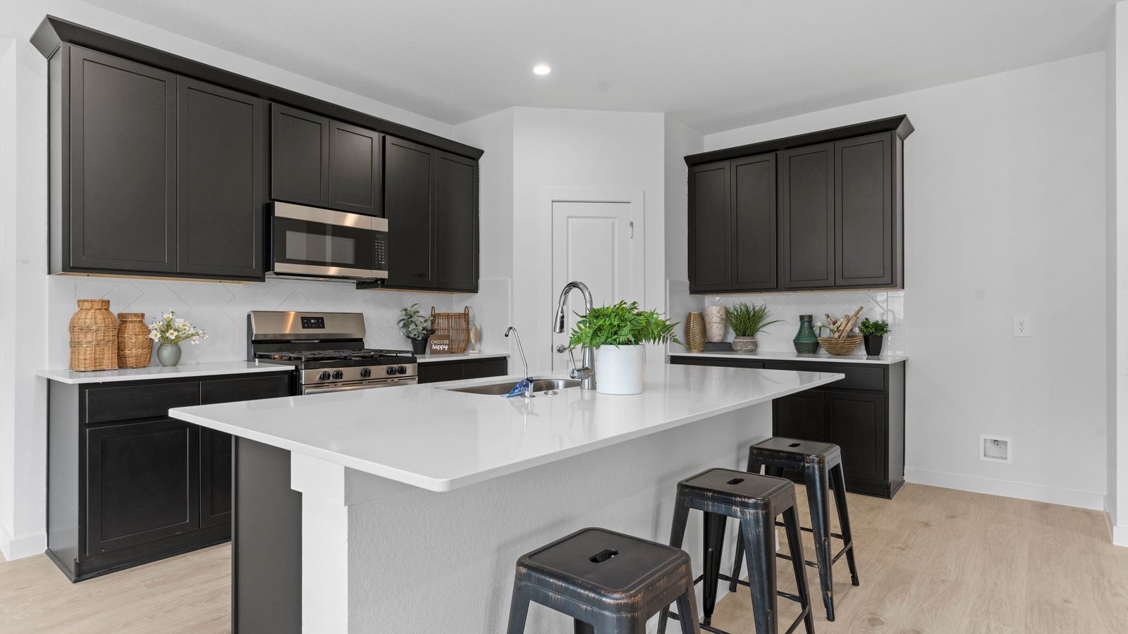 Spacious open concept kitchen with island and counter prep space