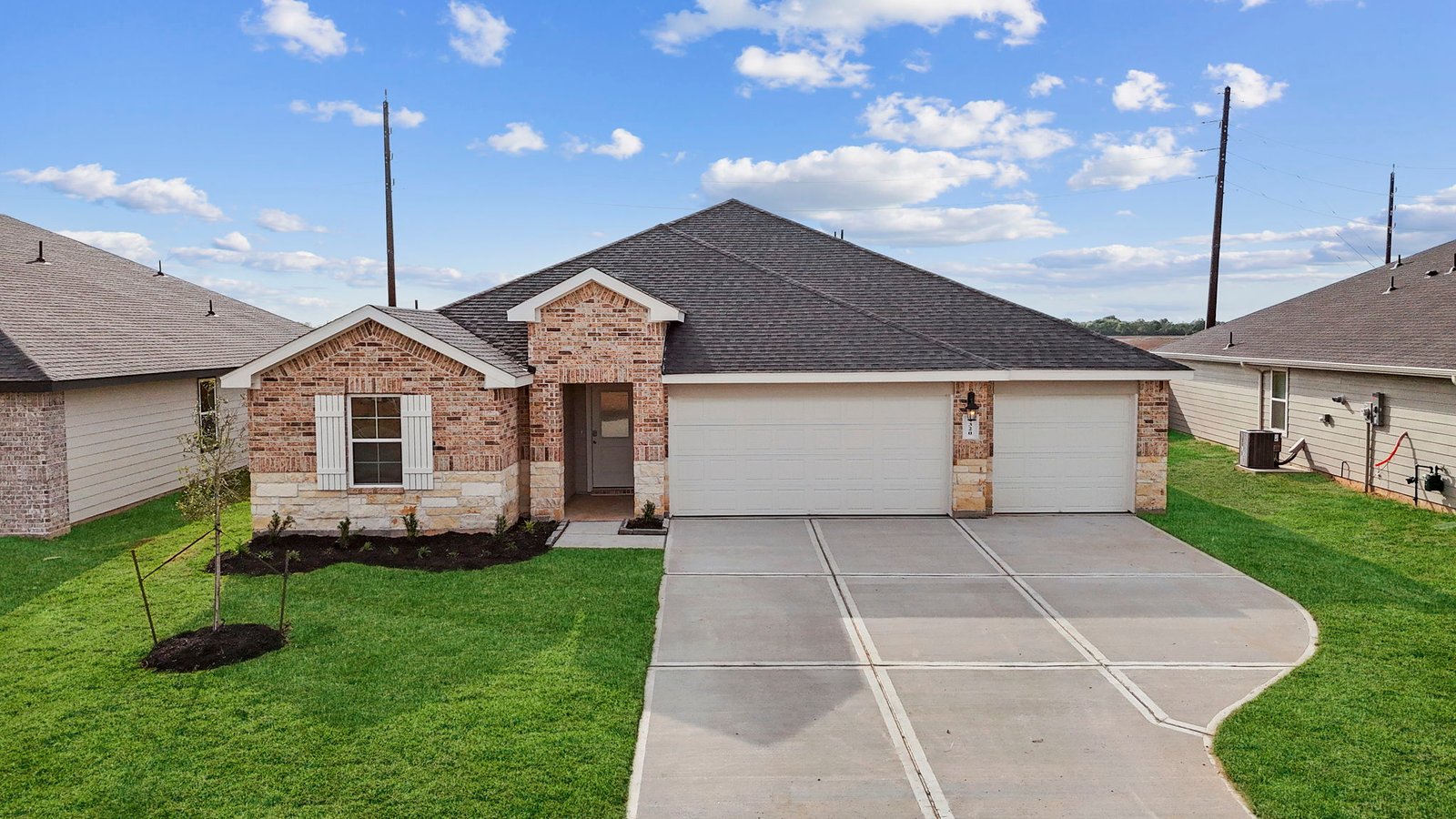 Exterior of single story modern brick style home