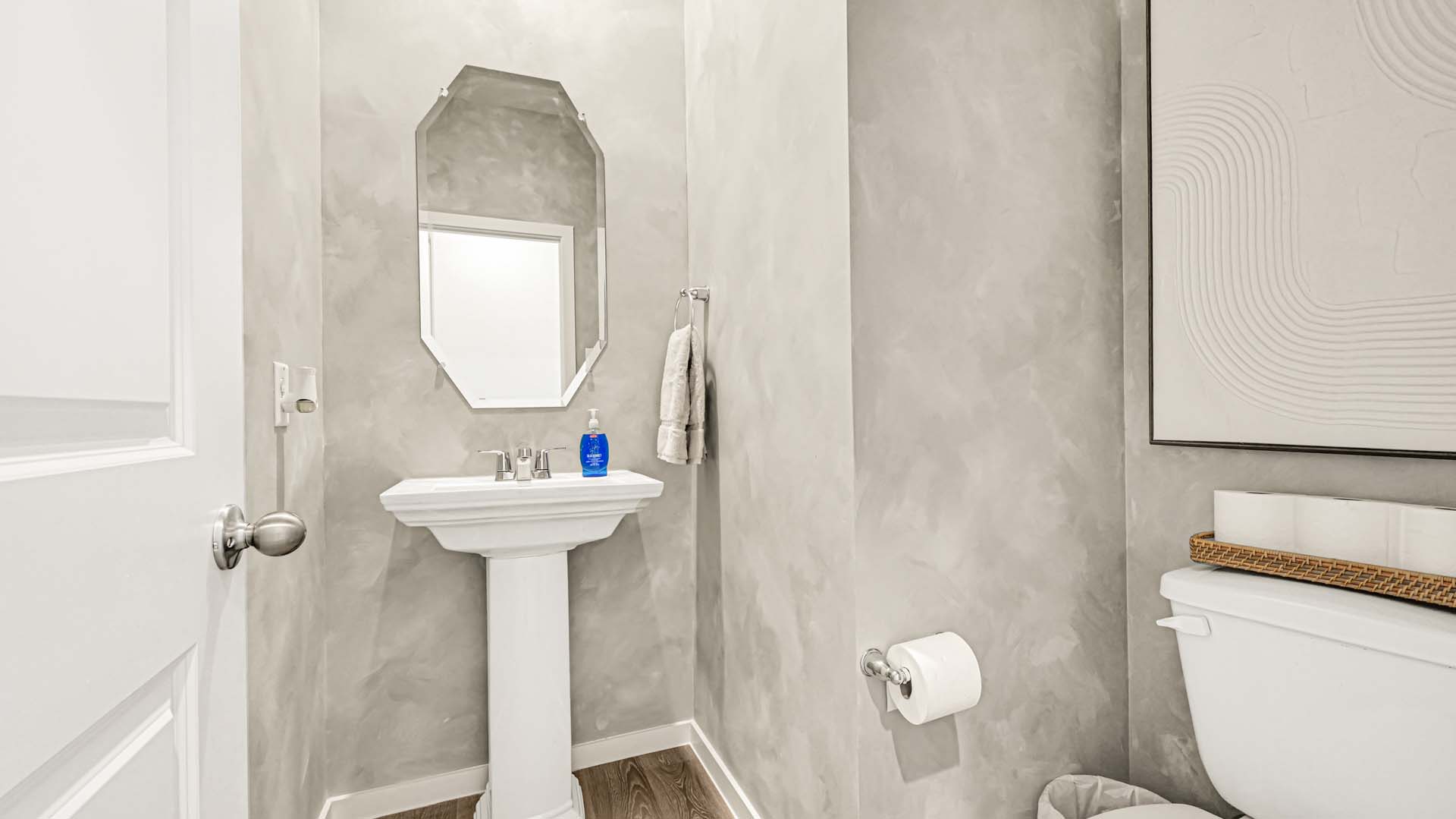 Half bathroom between common spaces