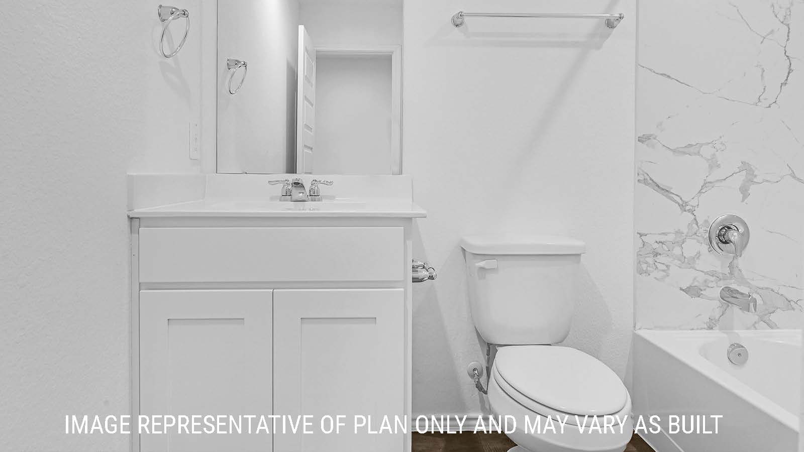 Fairfield secondary bathroom with vanity sink with white cabinets and granite countertop.