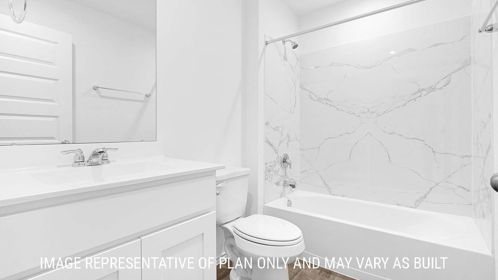 Fairfield secondary bathroom with vanity sink and shower and tub combo.