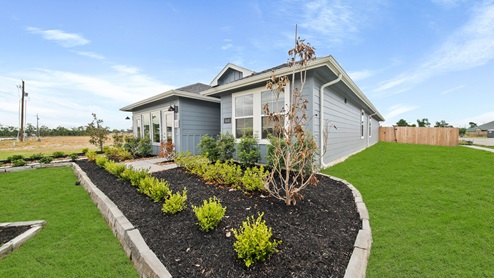 Reserve at Mallard Lakes model home exterior elevation front view with landscape