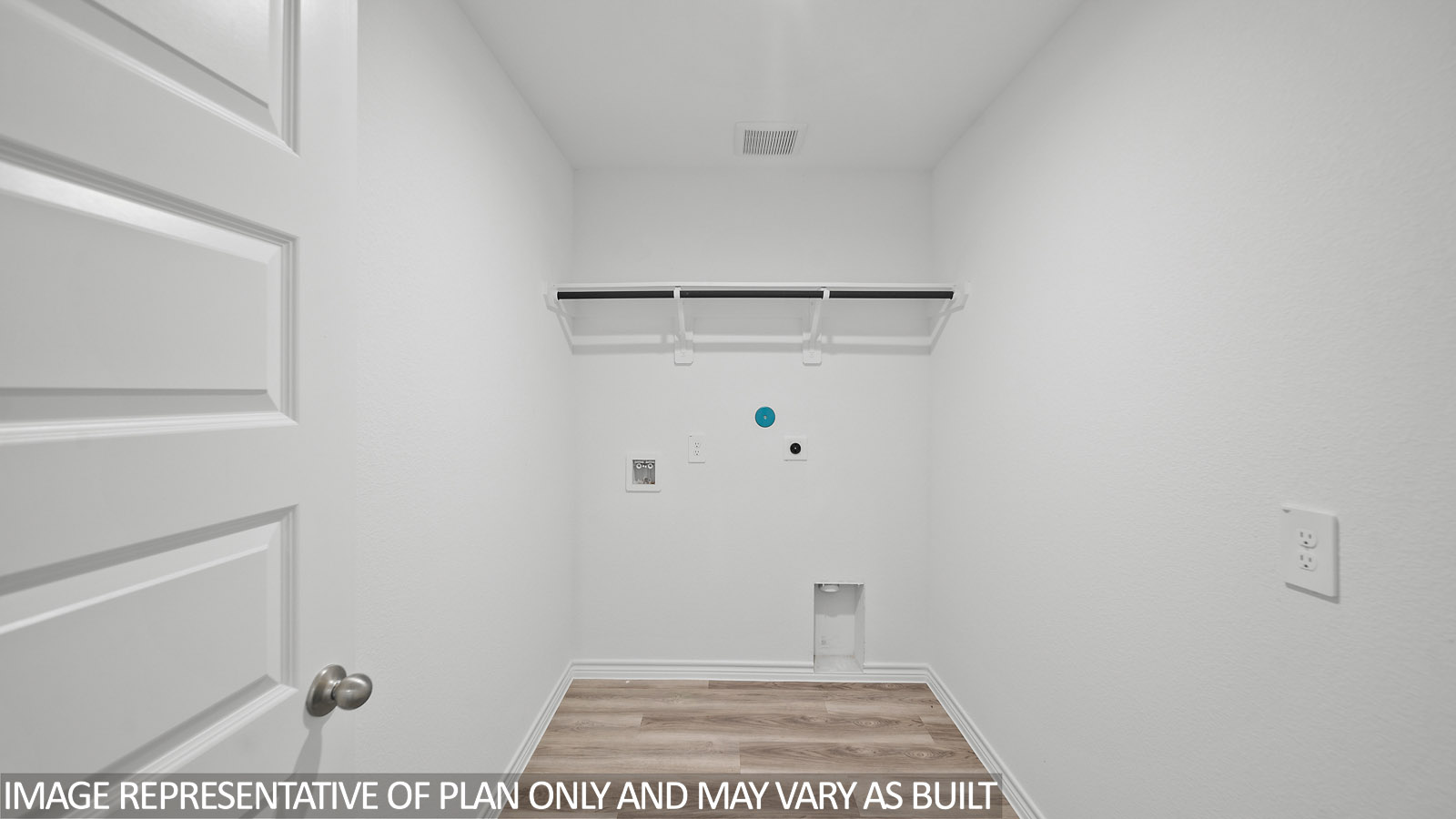 Baxtor utility room with vinyl plank flooring.