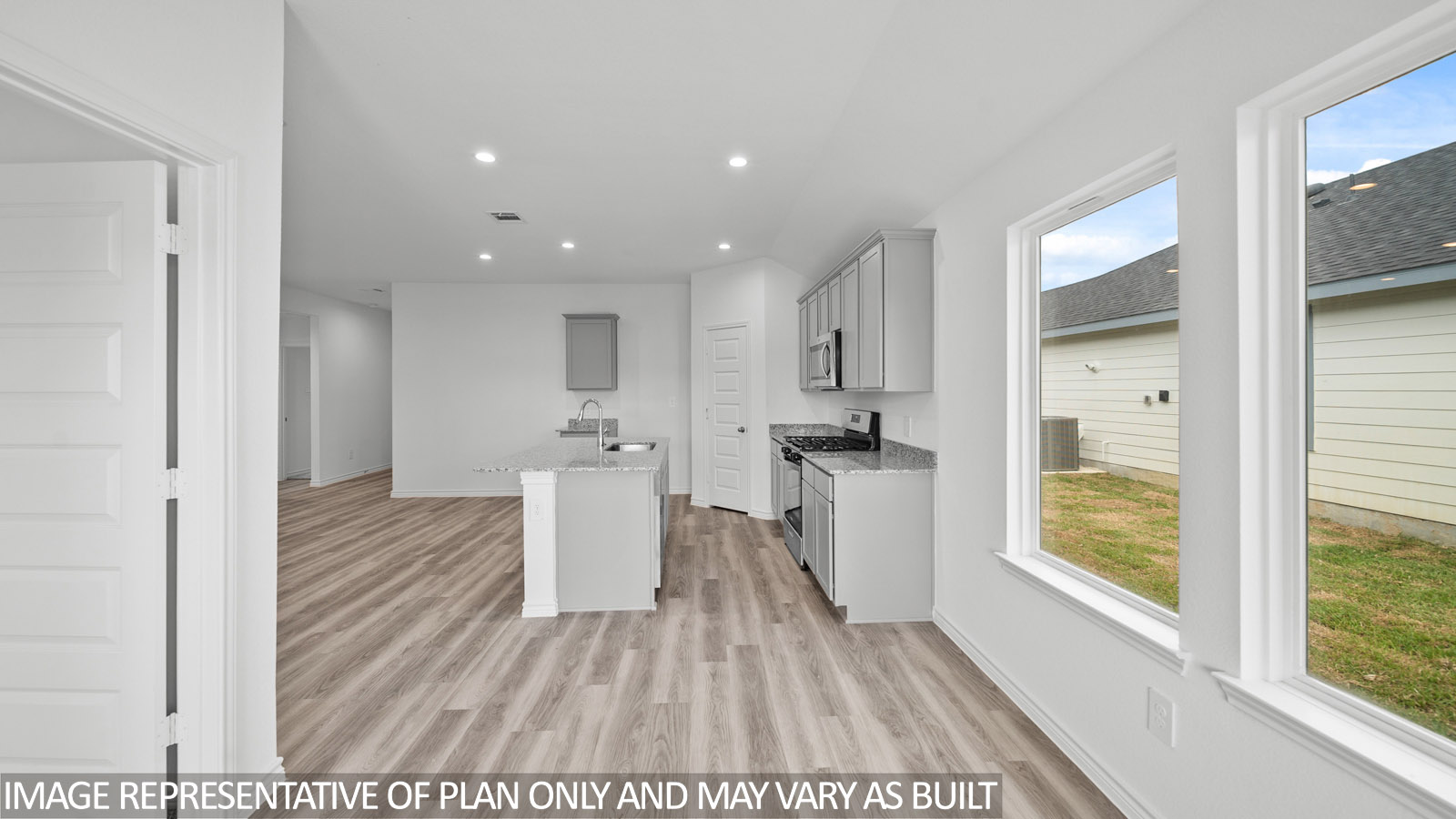 Baxtor view of open kitchen and living areas.
