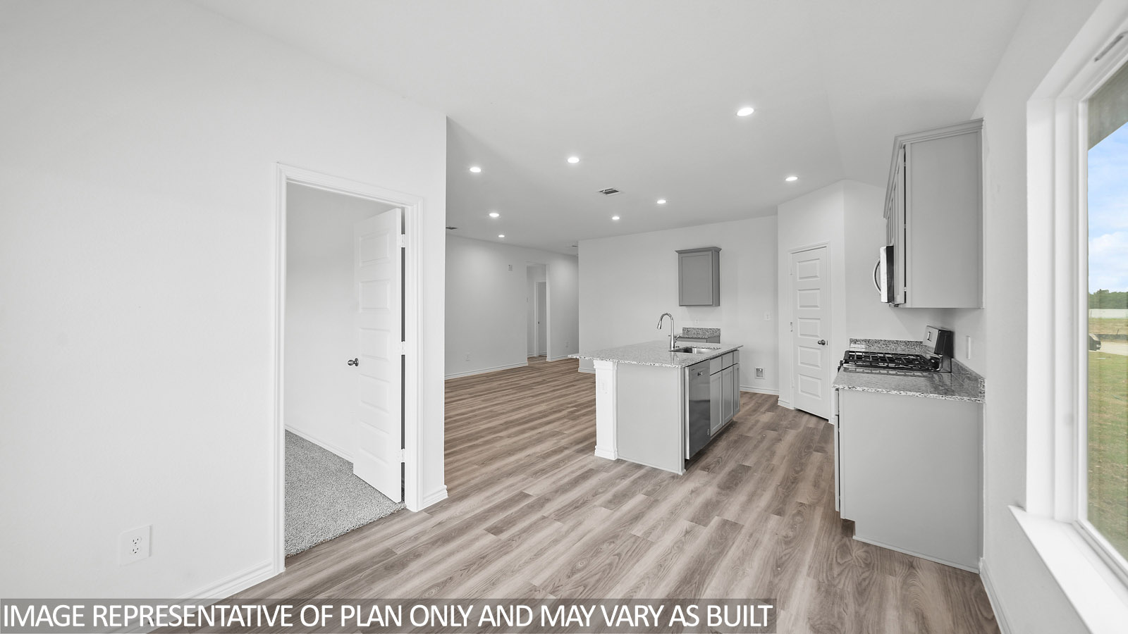 Baxtor view of open kitchen and living areas.