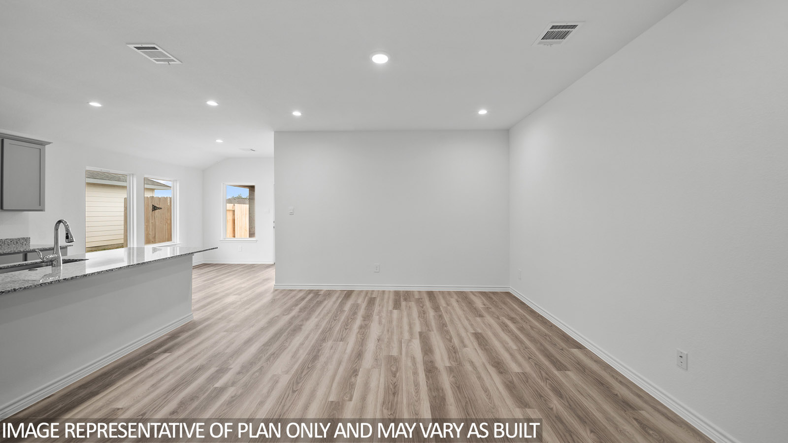 Baxtor living room with vinyl plank flooring.