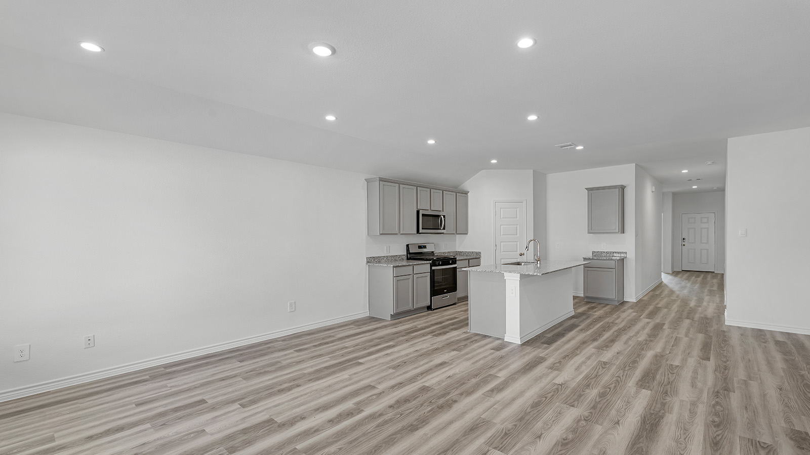 Harris open concept living room with view of the kitchen.