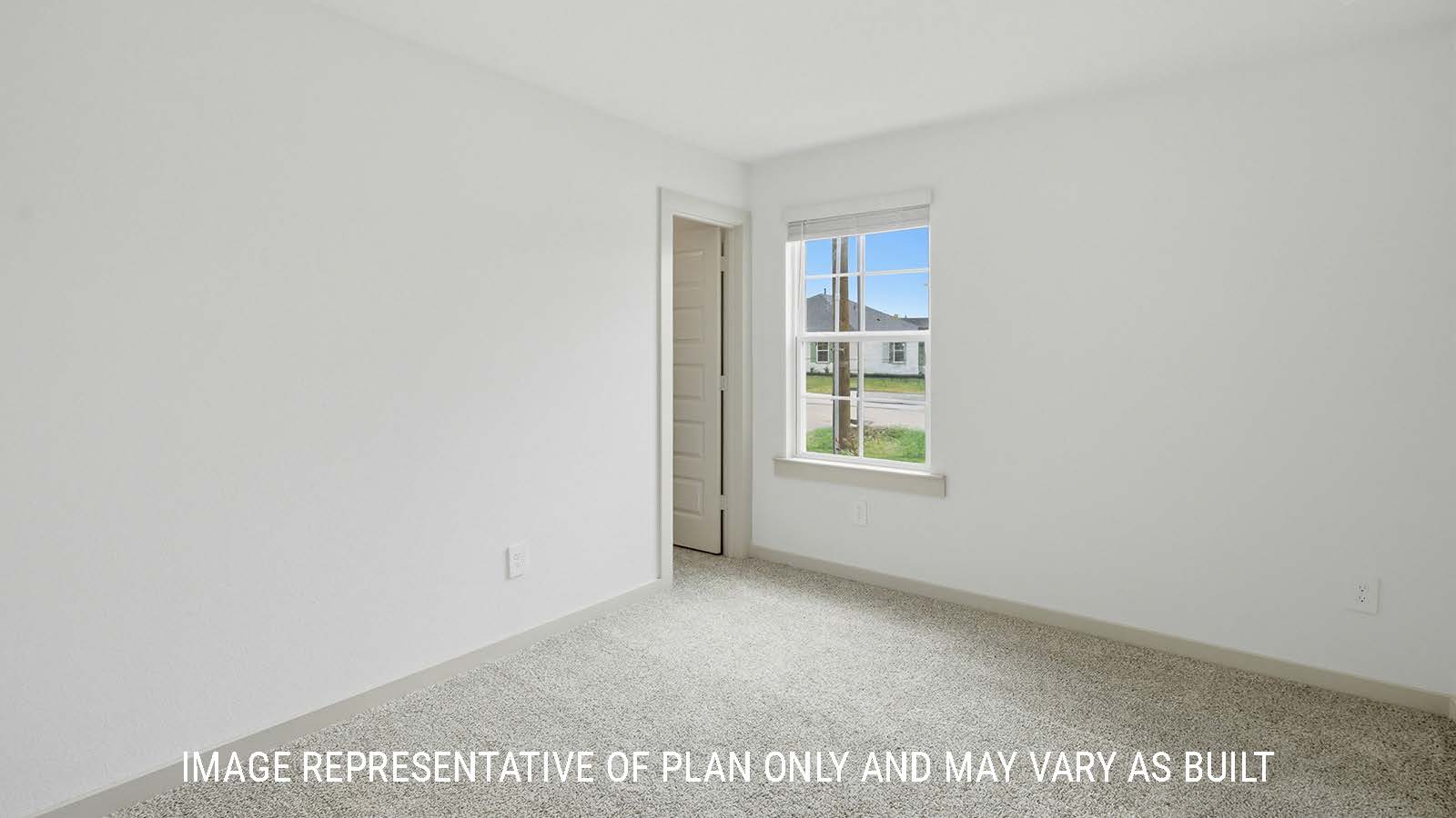 Bellvue secondary bedroom with capreted flooring and window for natural lighting.