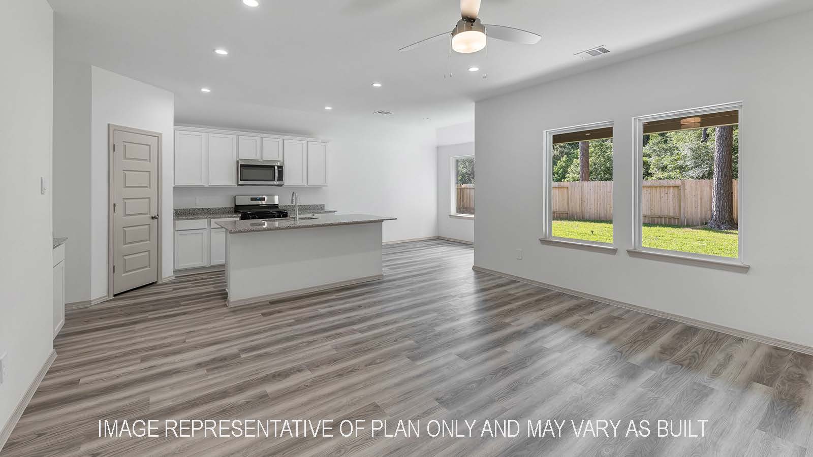 Bellvue living room open concept with view of kitchen and dining room.