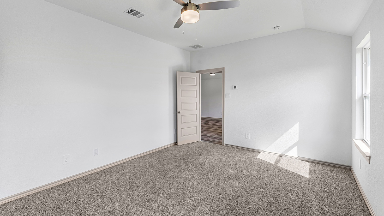 Camden living room open concept with view of dining room and kitchen.