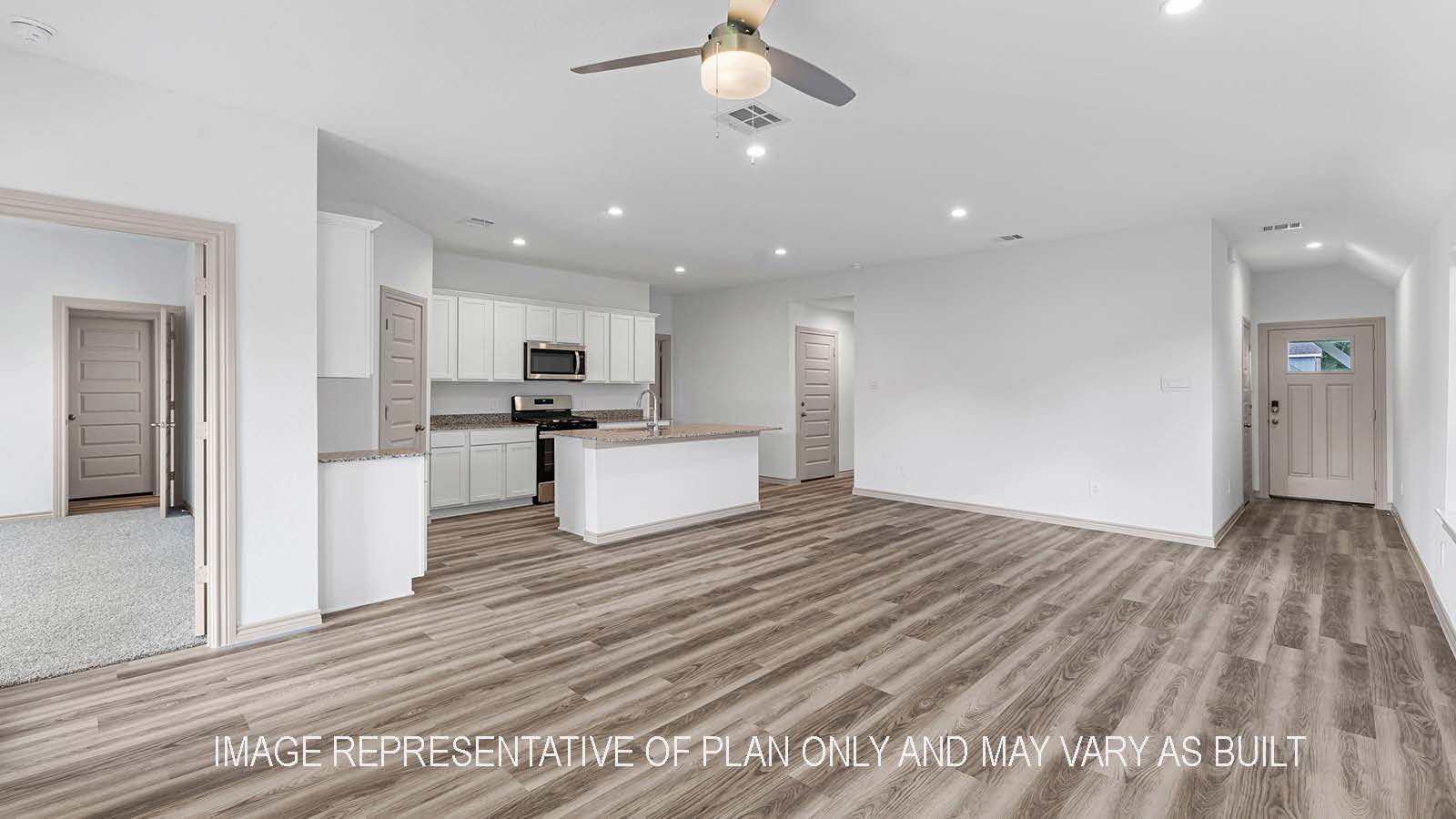 Camden kitchen with light cabinets and granite countertops.