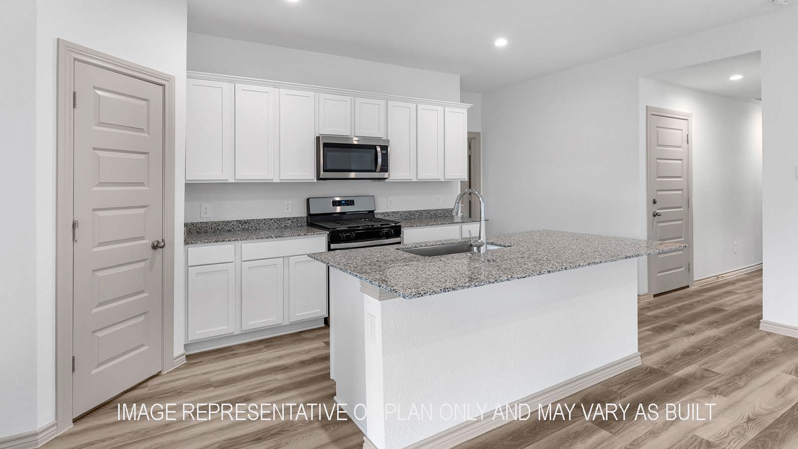 Camden living room open concept with view of dining room and kitchen.