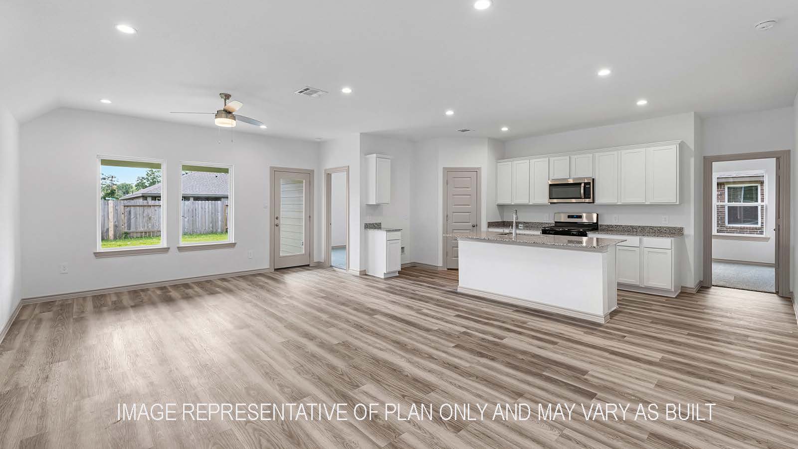 Camden living room open concept with view of dining room and kitchen.