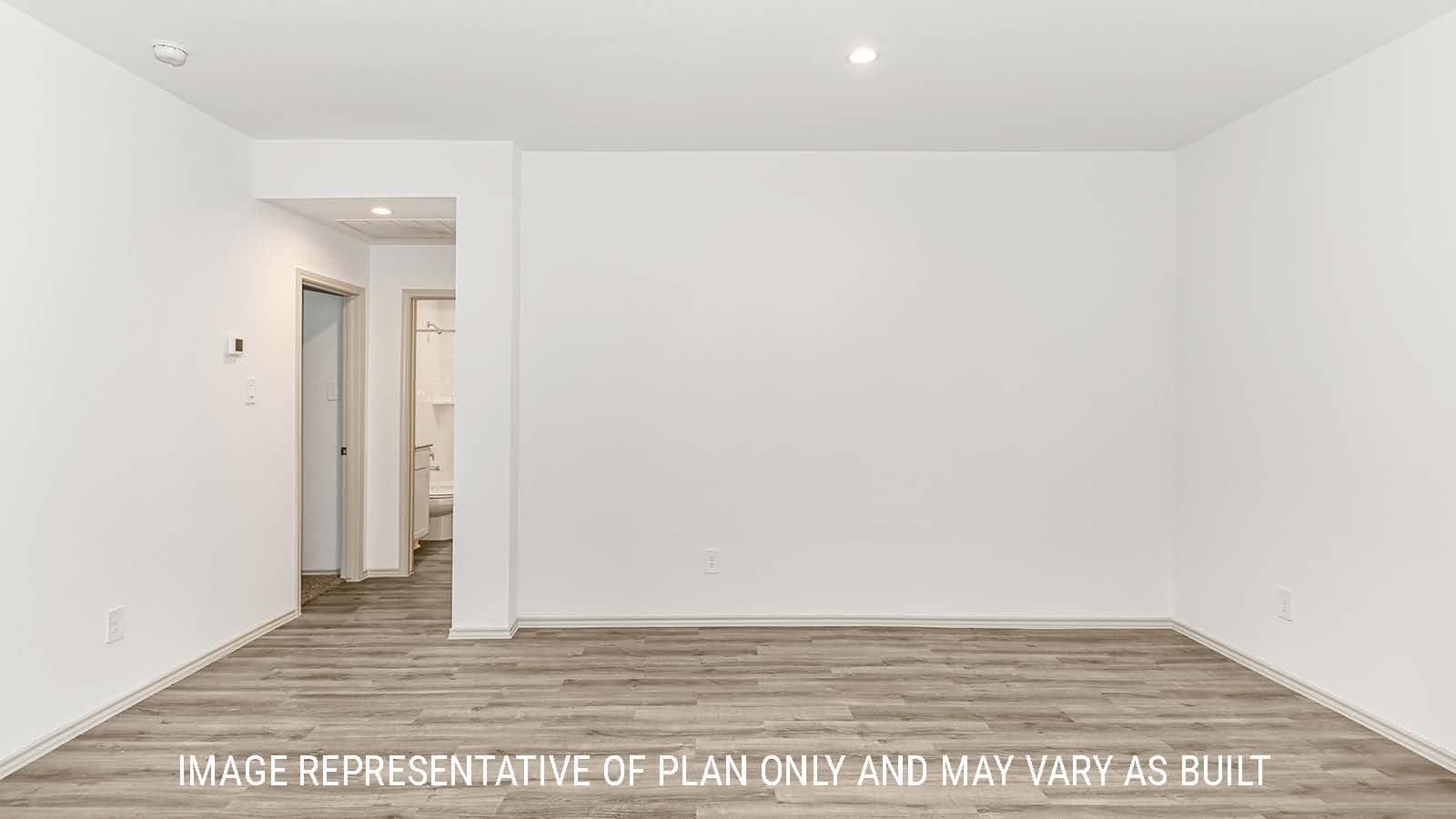 Lakeway dining room with vinyl plank flooring and view of hallway.