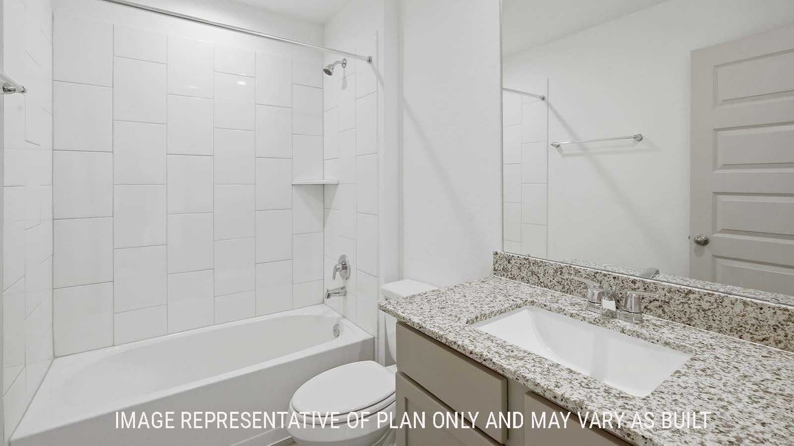 Lakeway secondary bathroom with vanity sink and shower and tub combo.