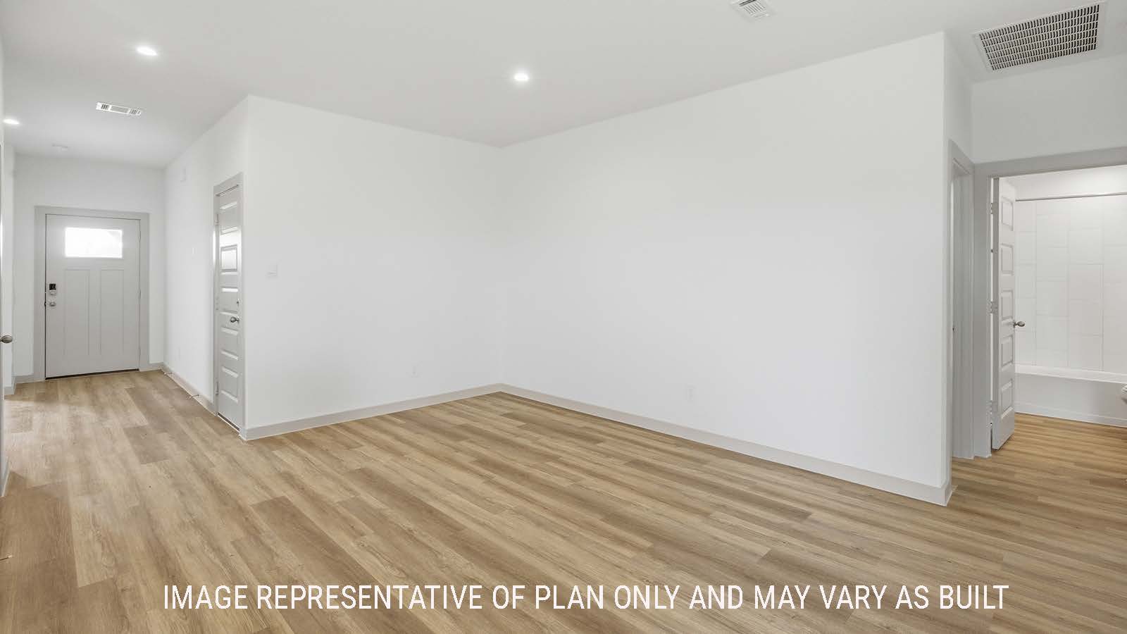 Lakeway dining room with vinyl plank flooring with view of front entry hallway.