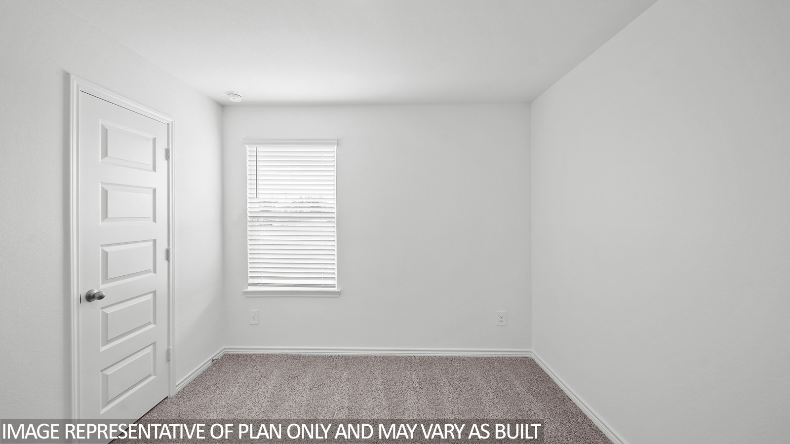 Harris secondary bedroom with carpet and window.