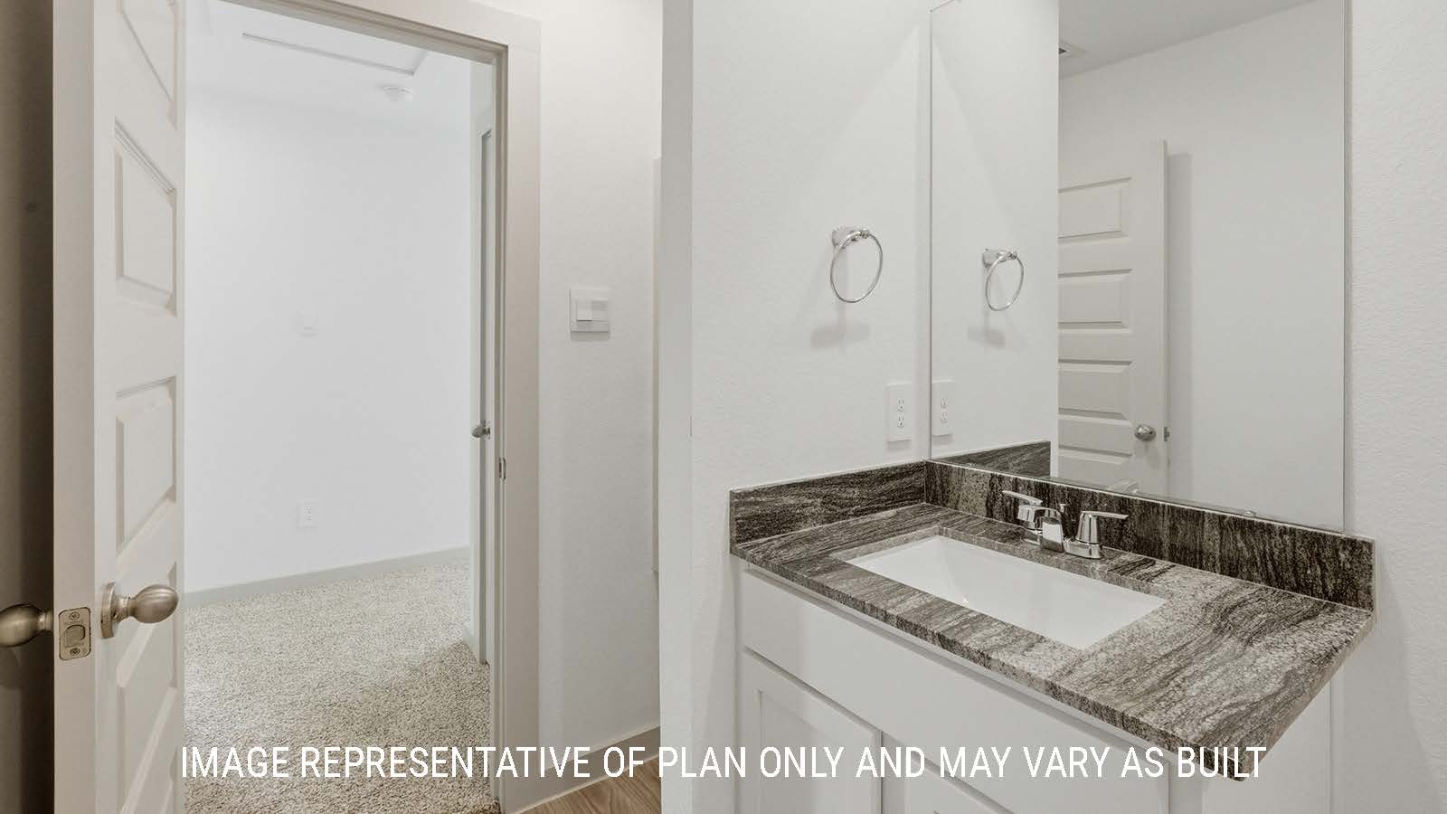 Mitchell secondary bathroom with vanity sink and view of hallway to game room.