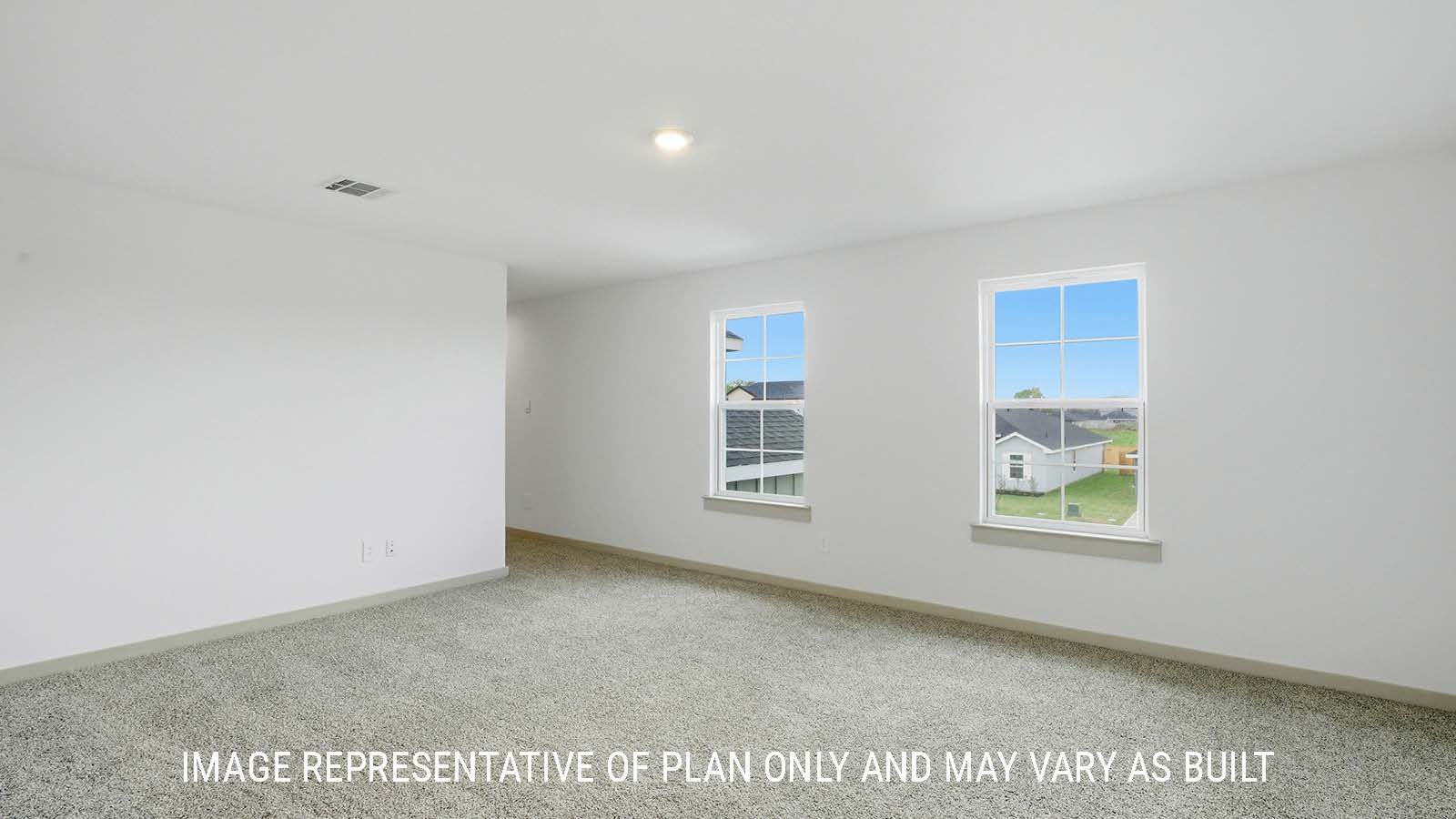 Mitchell game room with carpeted flooring and windows for natural lighting.