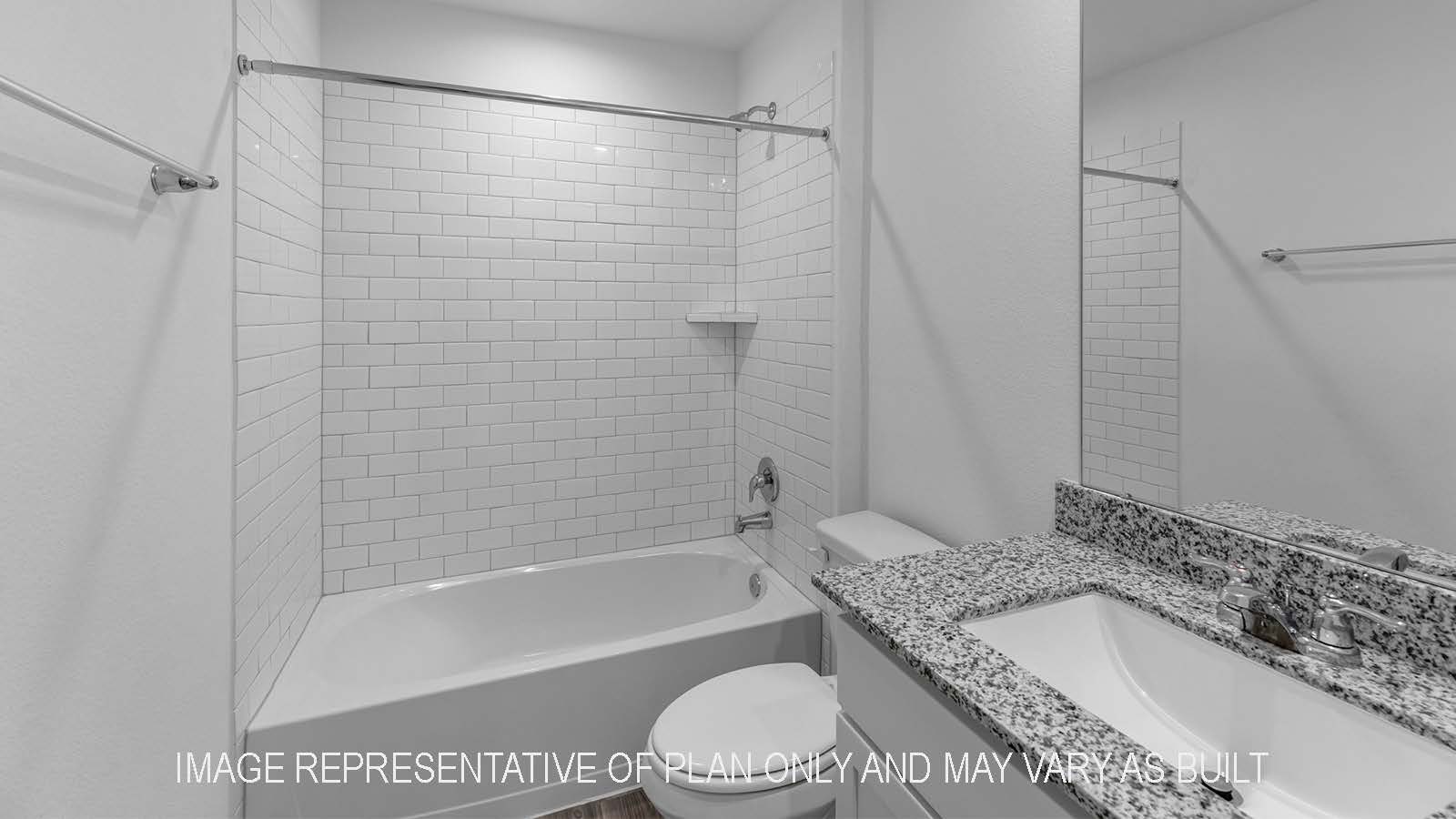 Bellvue secondary bathroom with vanity sink and shower and tub combo.