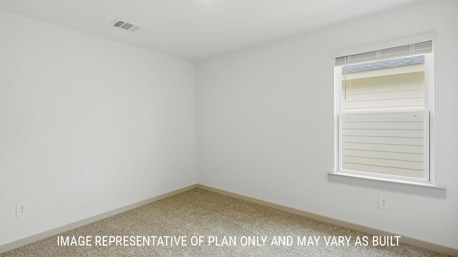 Bellvue secondary bedroom with capreted flooring and window for natural lighting.