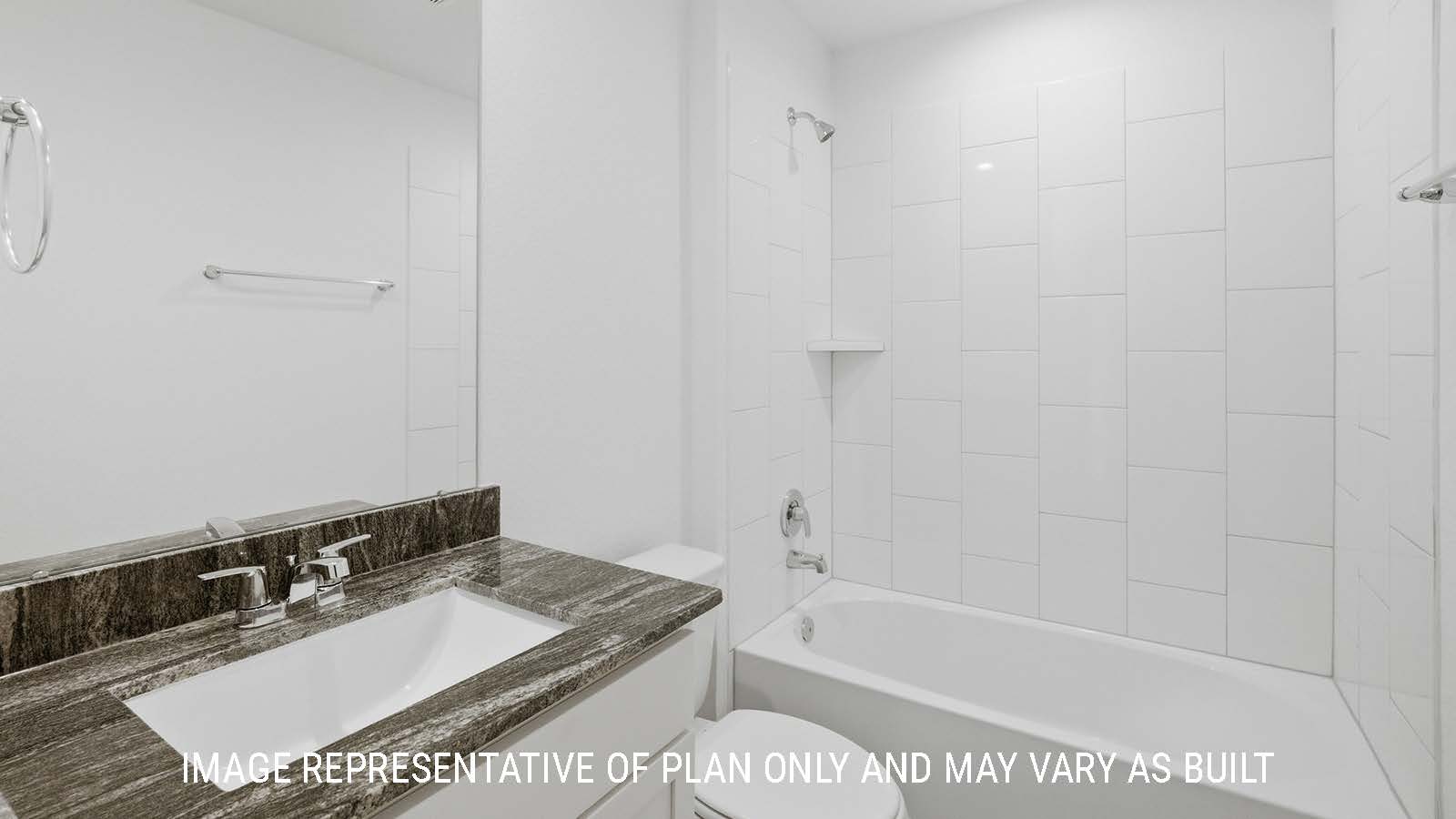 Bellvue secondary bathroom with vanity sink and shower and tub combo.