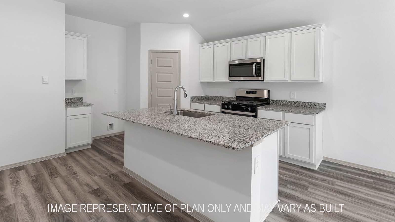 Bellvue kitchen island with light cabinets and granite countertops.