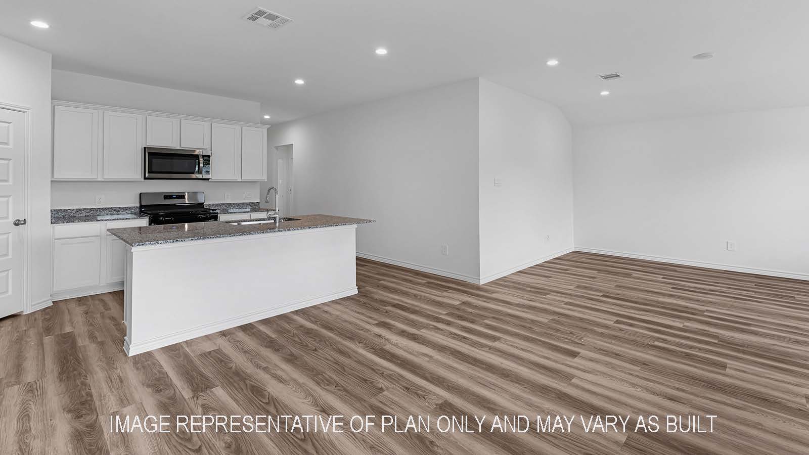 Denton dining room open concept with view of kitchen and living room.