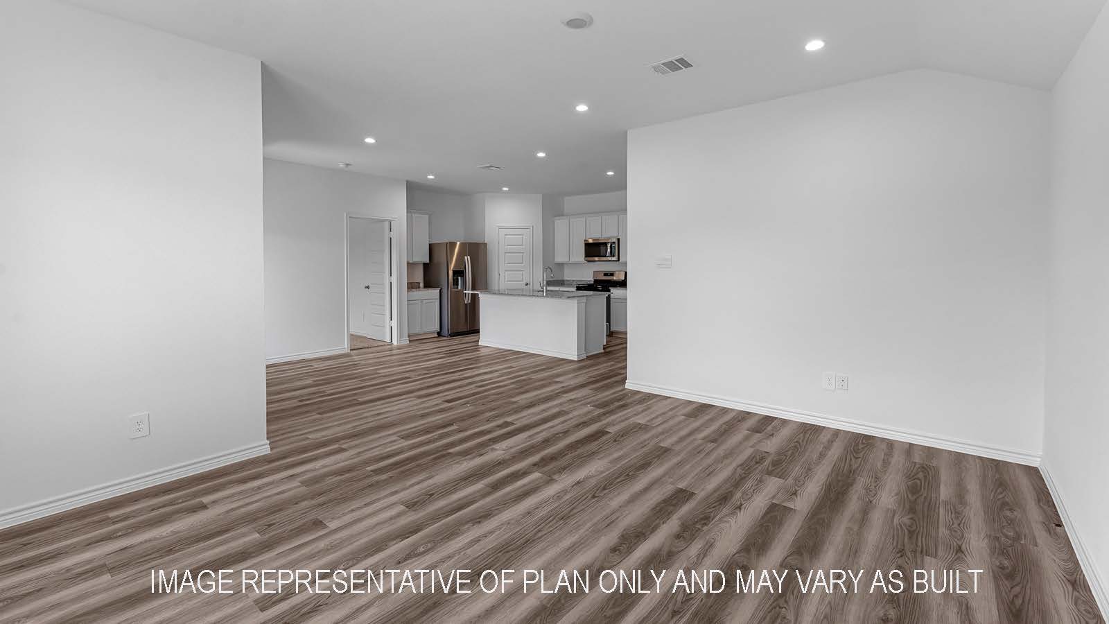 Denton living room open concept with view of kitchen and dining room.
