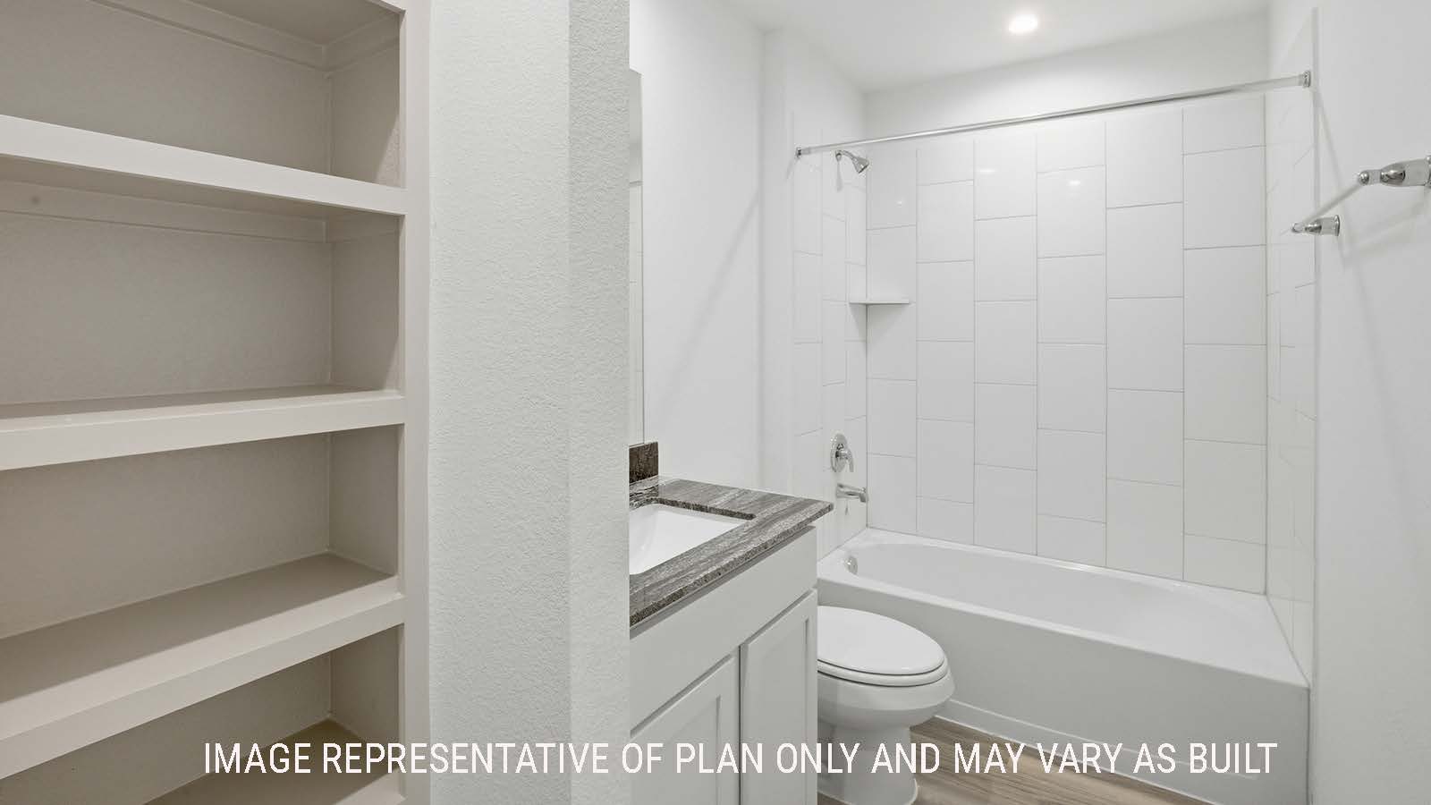 Kingston secondary bathroom with shelving for storage and vanity sink.