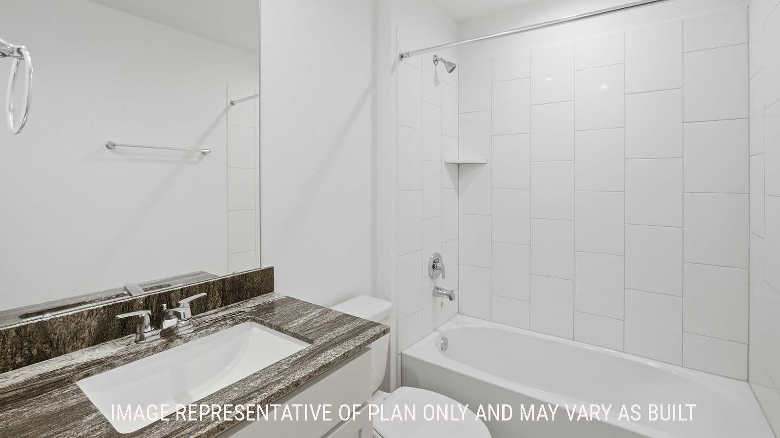Kingston secondary bathroom with vanity sink and shower and tub combo.