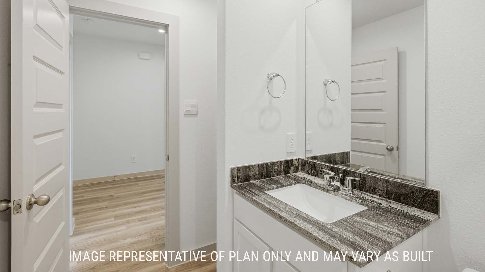 Kingston secondary bathroom with shelving for storage and vanity sink.