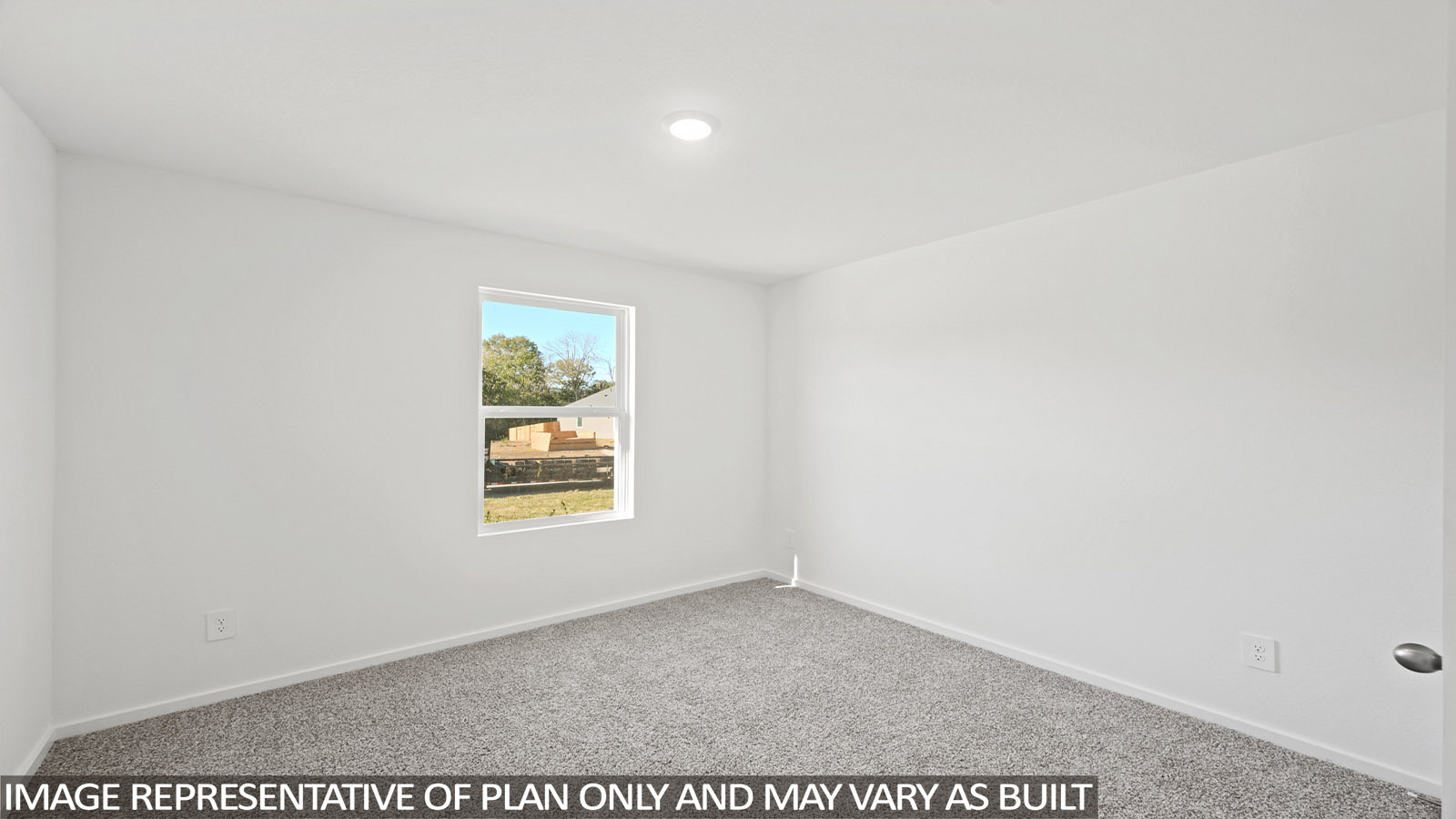 Callahan secondary bedroom with carpeted flooring and window for natural lighting.