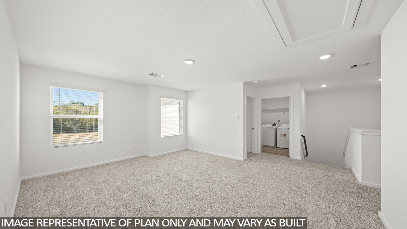 Dawson game room with carpeted flooring and view of laundry room and stairs.