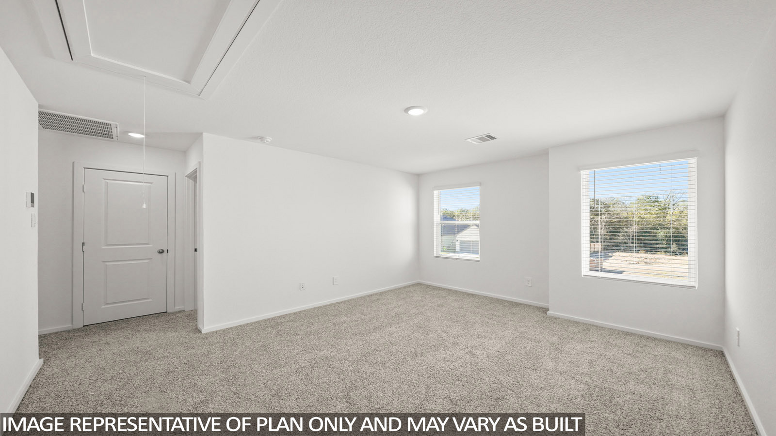 Dawson game room with carpeted flooring and windows for natural lighting.