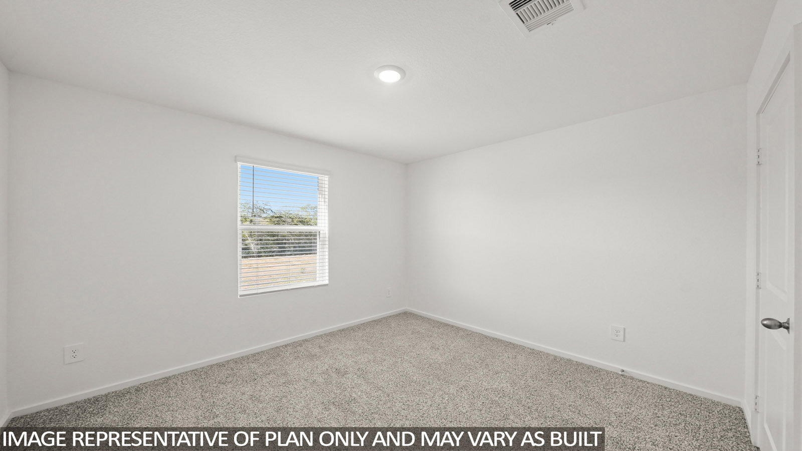 Dawson secondary bedroom with capreted flooring and window with natural lighting.