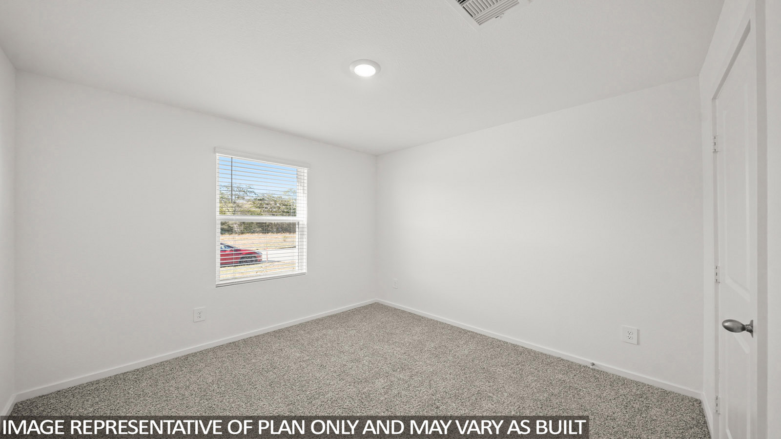 Dawson secondary bedroom with capreted flooring and window with natural lighting.