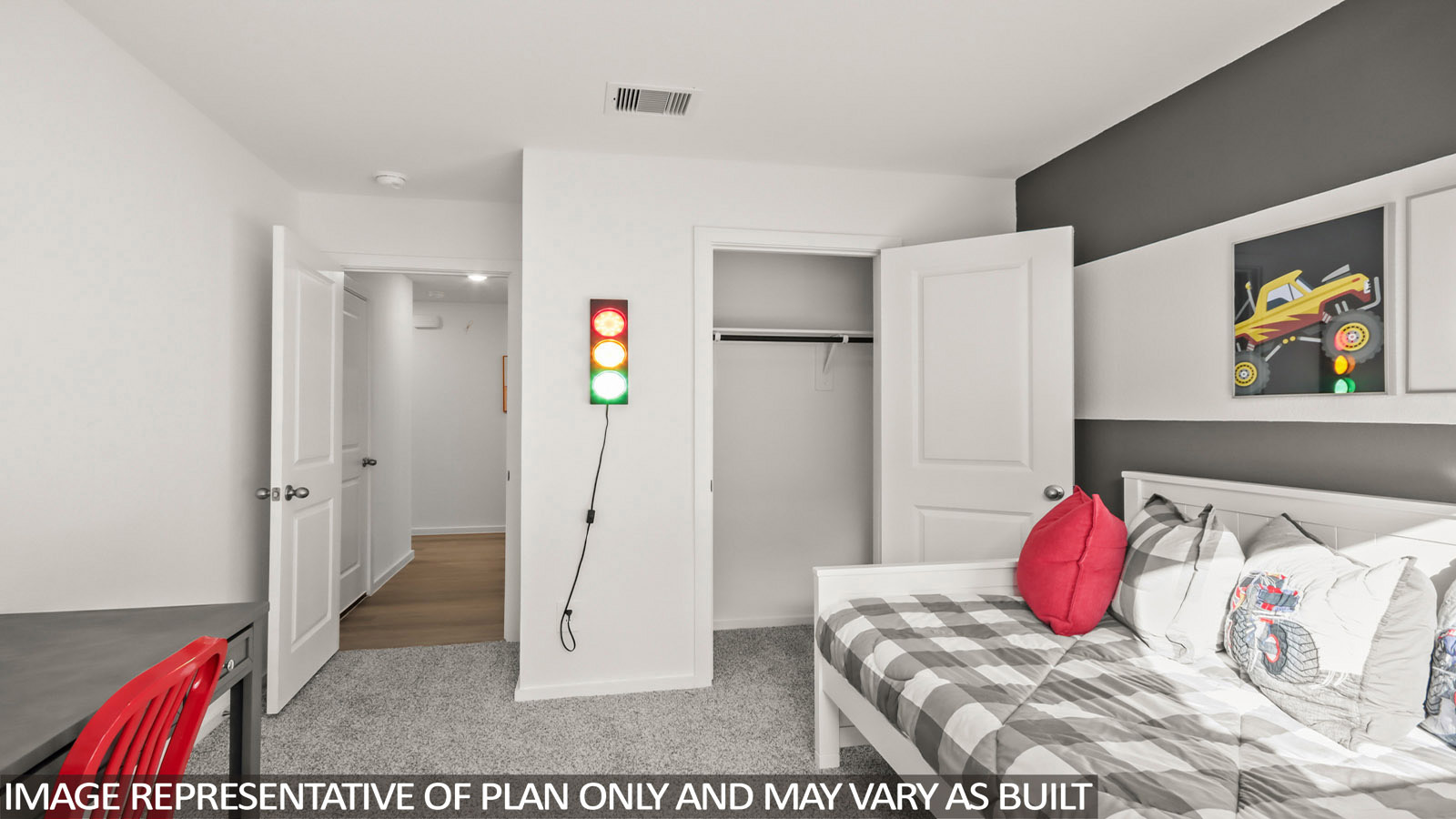 Austin secondary bedroom with carpeted flooring and view of hallway.