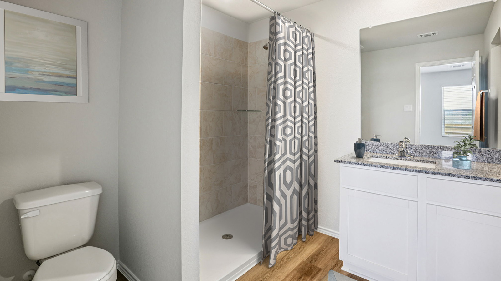 China Cottages primary bathroom with vanity sink and walk-in shower.