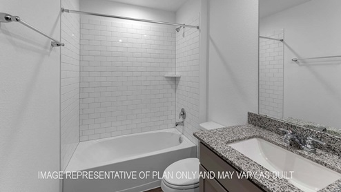 Cali secondary bathroom with vanity sink and shower and tub combo.