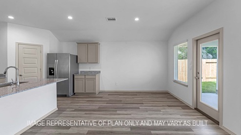 Cali dining room open concept with view of backyard.