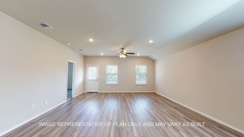 Kingston open concept dining room and living room with vinyl plank flooring throughout.