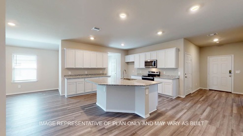 Kingston kitchen entry with view of living and dining room.