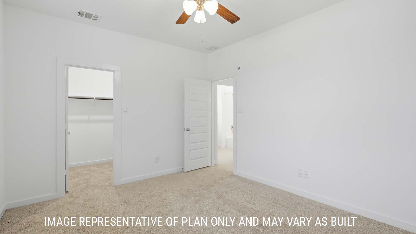 Berkshire secondary bedroom with carpeted flooring and view of closet and hallway.